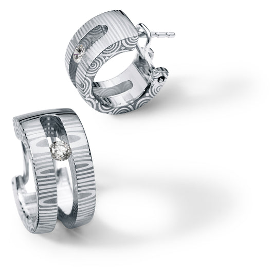 Diamantcreole, jeweils 2 Brillanten 0,06 ct. TW VS, mit integriertem Clip, Damaszenerstahl